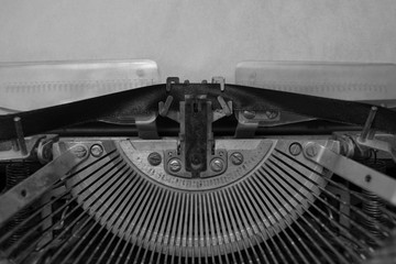 vintage typewriter with a clean sheet of paper. writer, journalist.