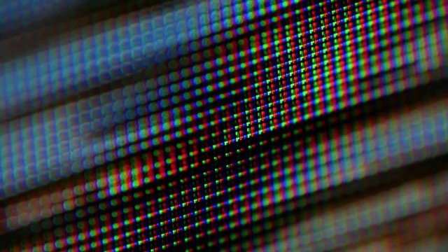 Macro shot of pixels of an LCD monitor displaying water reflections