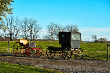 Fototapeta na wymiar Amish Buggies at Roadside for Sale