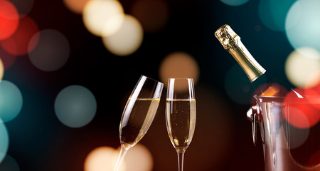 Champagne glasses on black background. Holiday celebration concept.