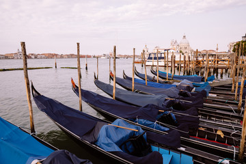 Fototapeta na wymiar Panoramic view of Laguna Veneta coast of Venice city with gondolas