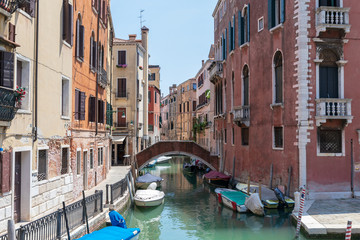 Fototapeta na wymiar Panoramic view of Venice narrow canal with historical buildings