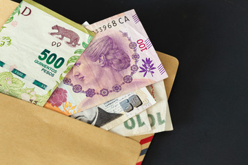 Argentinean peso in an envelope