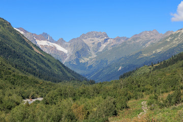 Fototapeta premium Panorama view of mountains scenes in national park Dombay, Caucasus