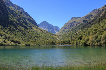 Closeup view of lake scenes in mountains, national park Dombay, Caucasus