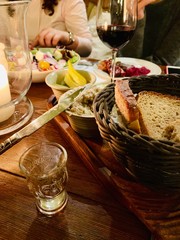 Dinner in restaurant. Bread and butter with knife