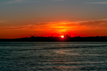 Fototapeta premium Istanbul, Turkey, 06 July 2006: Sunset at Kadikoy