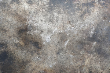 grunge metal texture from the bottom of old cooking pot