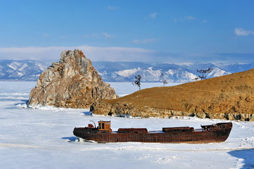 The ship is surrounded by ice on Lake Baikal.