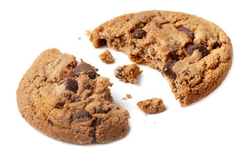 Piece of Chocolate chip cookie with crumbs isolated on white background.