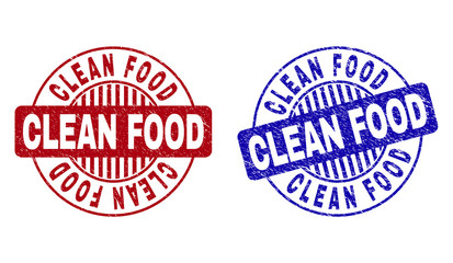 Grunge CLEAN FOOD round stamp seals isolated on a white background. Round seals with grunge texture in red and blue colors.