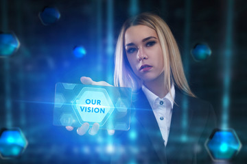 The concept of business, technology, the Internet and the network. A young entrepreneur working on a virtual screen of the future and sees the inscription: Our vision