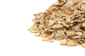 Oatmeal closeup, isolated on white, selective focus