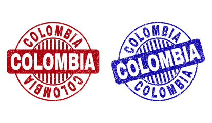 Grunge COLOMBIA round stamp seals isolated on a white background. Round seals with grunge texture in red and blue colors. Vector rubber overlay of COLOMBIA tag inside circle form with stripes.
