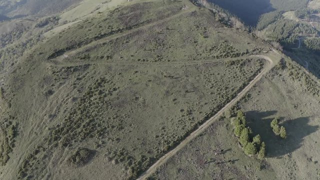 Hermitage in Kolitza peak in Balmaseda 338, Basque Country, Spain drone aerial footage - ungraded (graded version available)