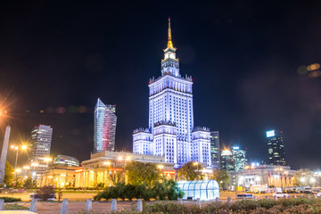 Plakat The Palace of Culture and Science, one of the symbols of Warsaw, Poland. Night view.
