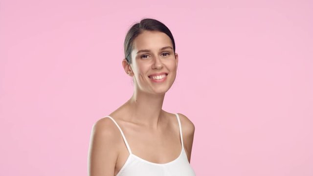 Young brunette woman throws out women shaver
