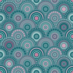 Seamless abstract pattern with overlapping circles and dots of blue and pink colors.