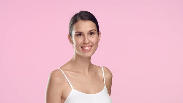 Young brunette woman throws out women razor