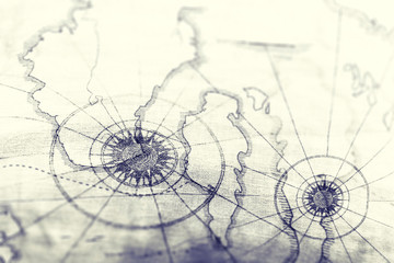 Closeup of old map for travel concept background. Vintage and retro backdrop.