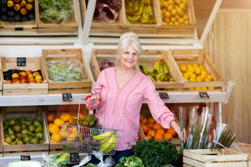 Woman shopping in small grocery store