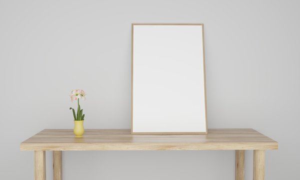 Empty white frame on table with white wall and a flower in pot 3D illustration