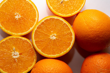 Fresh orange fruit isolated on white background close up