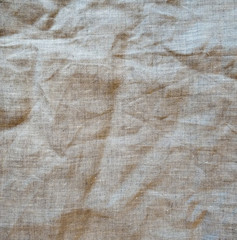  Wrinkled texture of cotton fabric. Linen fabric. Natural ecological material.
