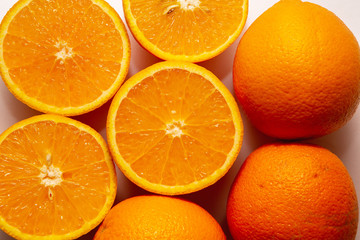 Fresh orange fruit isolated on white background close up