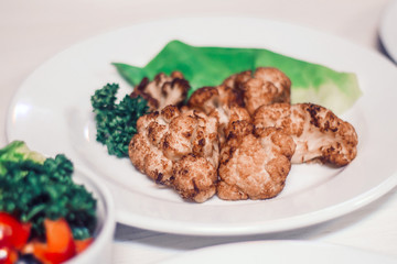 close up. cauliflower cooked on the grill.
