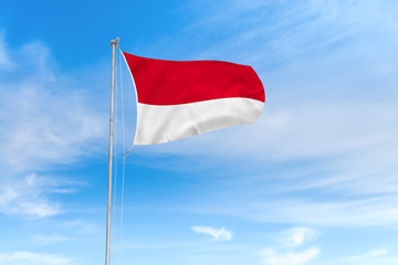 Indonesia flag over blue sky background