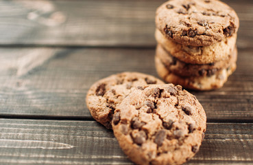 Chocolate chip cookies. On an old wooden table.