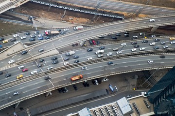 Top view to part of city road network. Multi level traffic junction.