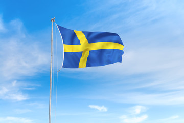 Sweden flag over blue sky background