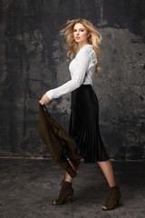Naklejka premium Fashion photo of a beautiful elegant young woman