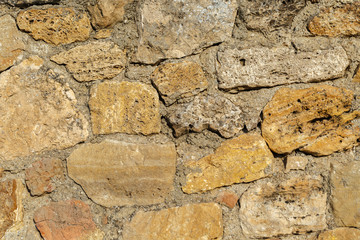 Masonry,illuminated by the bright sun
