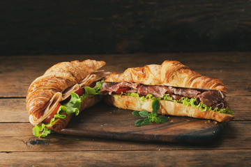 croissant sandwiches with ham and vegetables