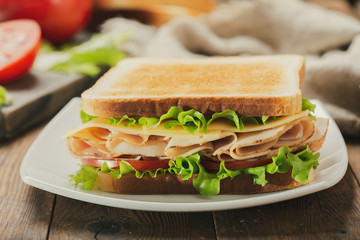 sandwich with ham and vegetables