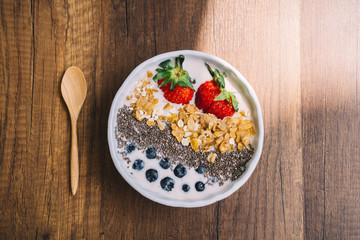 Yogurt with strawberry, blueberry, chia seed and cornflake