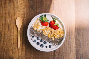 Yogurt with strawberry, blueberry, chia seed and cornflake