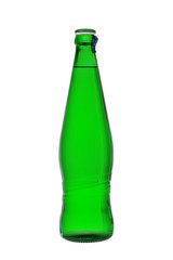 Mineral water in a bottle from green glass with a cover. Isolated on a white background