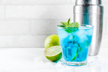 Iced blue alcohol cocktail