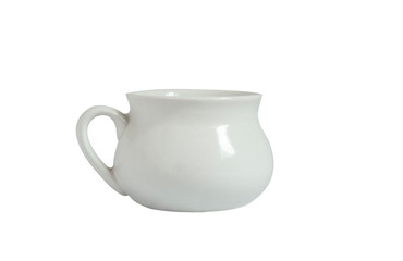 White ceramic jug with handle on white background. Isolated object. Kitchen utensils.
