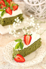 Green spinach cake with strawberry and cream