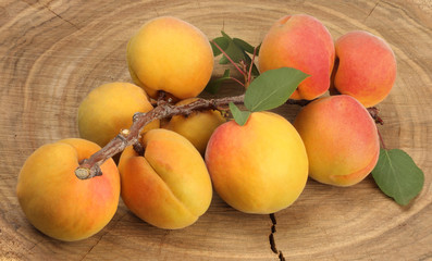 Apricots on wooden background