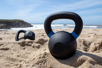 Kettebells at the sunny beach
