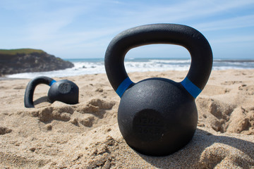 Kettebells at the sunny beach