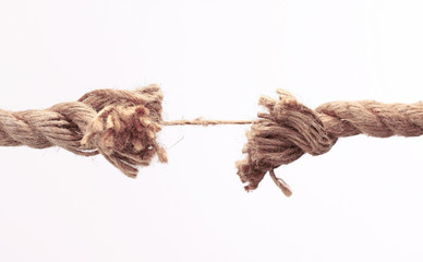 closeup.old frayed rope .isolated on a white background.