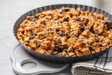 Vegan apple pie with cinnamon in the bakery dish.