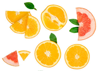 Slices of orange and grapefruit isolated on white, top view